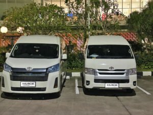 Toyota Hiace Premio parked at tourist spot - Bali Hiace Rental for Group Travel
